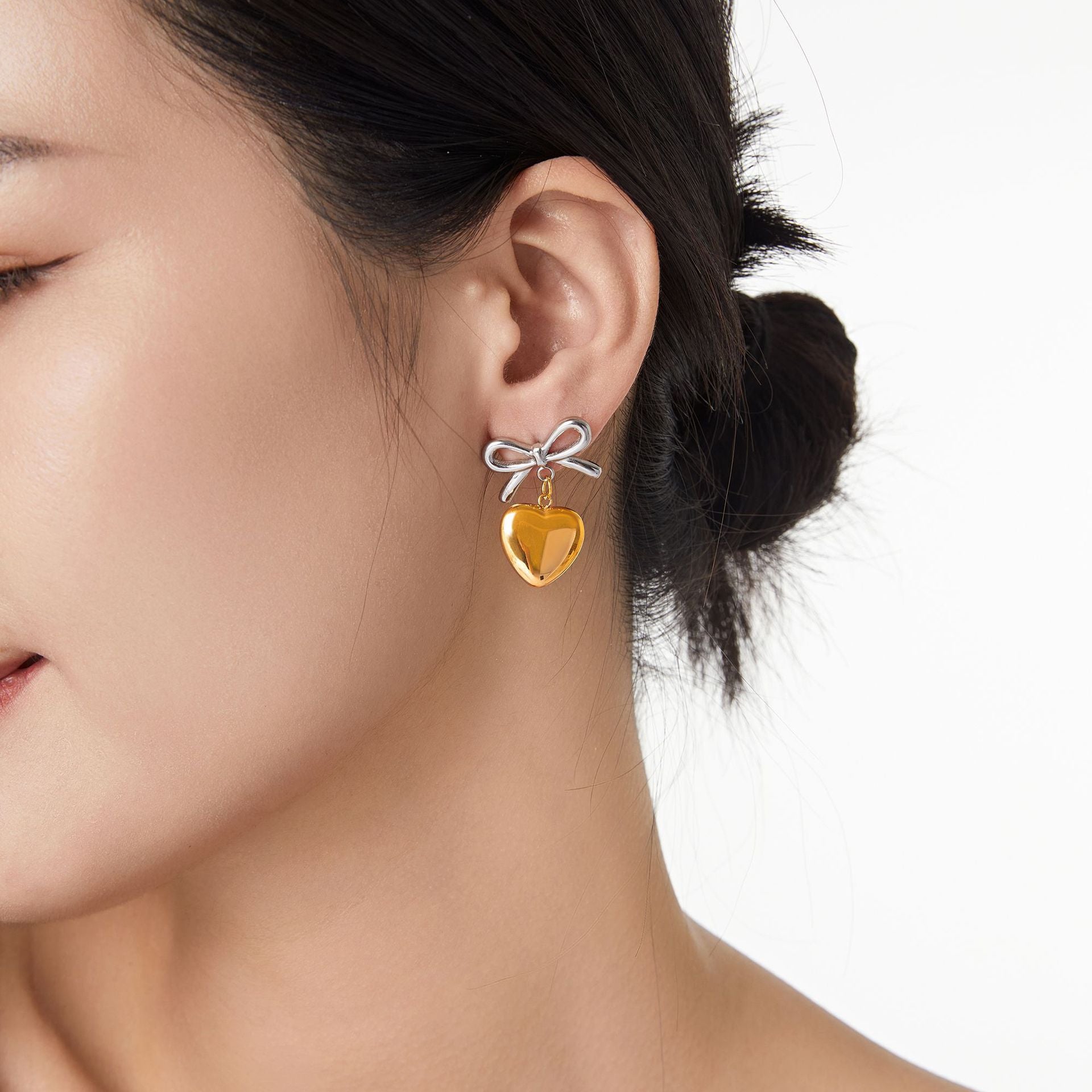 Wholesale Bow Heart Pendant 18K Gold Titanium Steel Earrings ACC-ES-OMK004