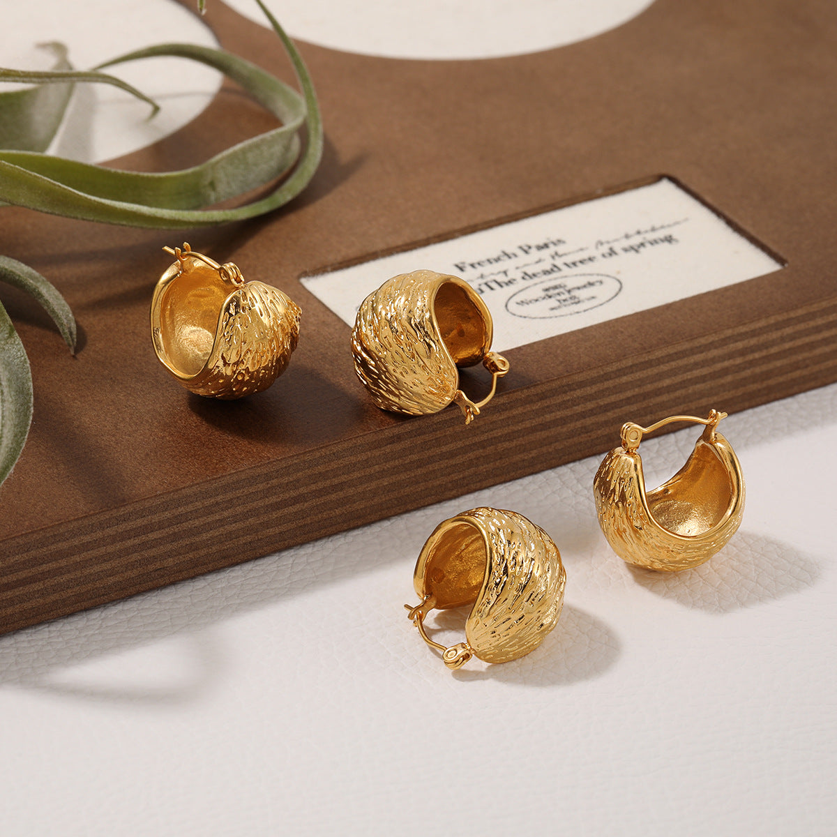 Wholesale Irregular semicircular hammer pattern earrings