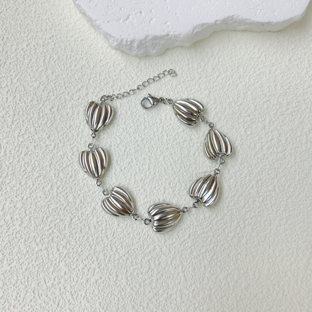 Wholesale Stainless Steel Three-dimensional Hollow Love Bracelet Necklace suit