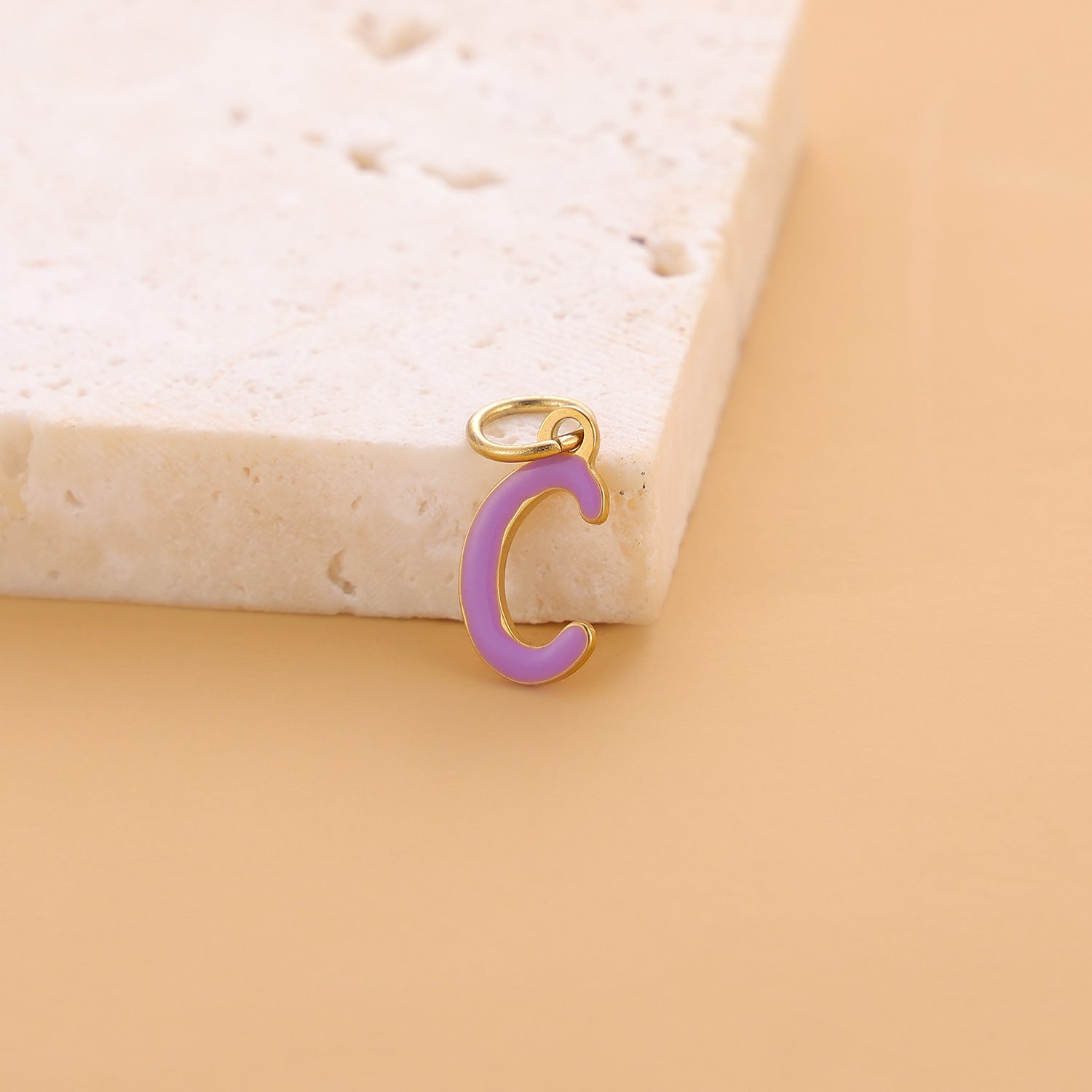 Wholesale Colorful 26 English letter pendant oil drop titanium steel vacuum plating pendant