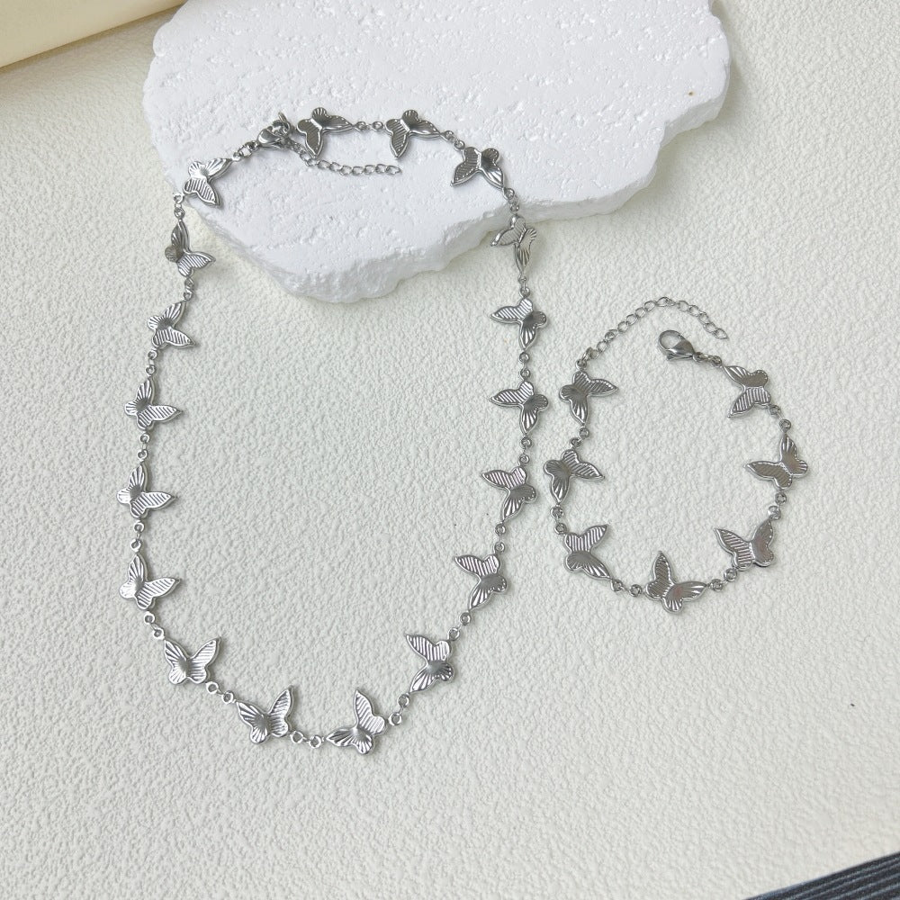 Wholesale  stainless steel three-dimensional hollow butterfly bracelet necklace suit