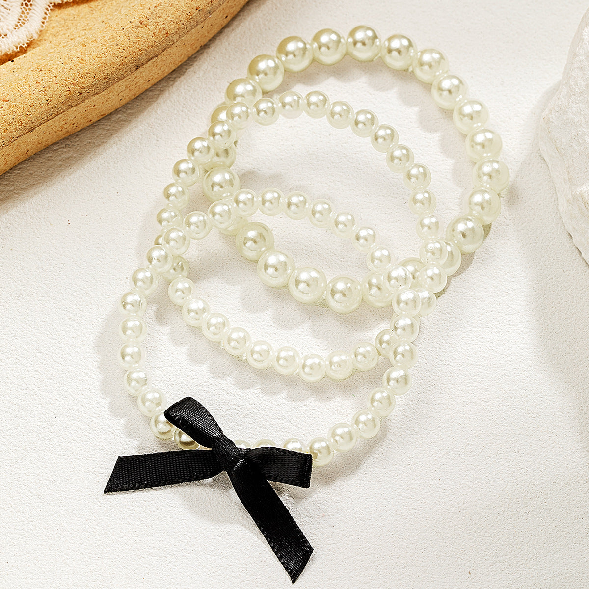 Wholesale Bow-knot pearl beaded stretch bracelet