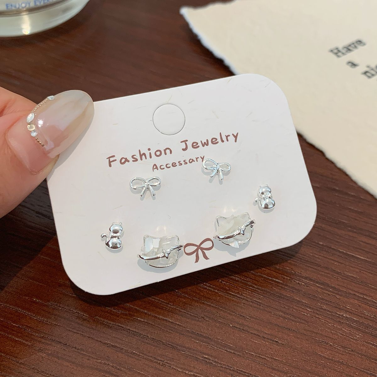 Wholesale Broken shells cat starfish earrings set silver needle heart bow earrings