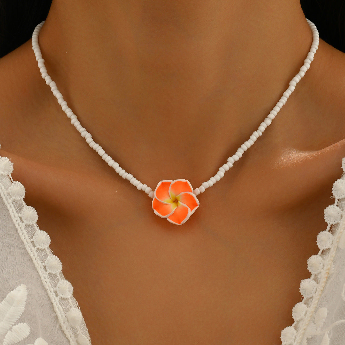 Wholesale Bohemian holiday style cute frangipani soft clay flower rice bead necklace