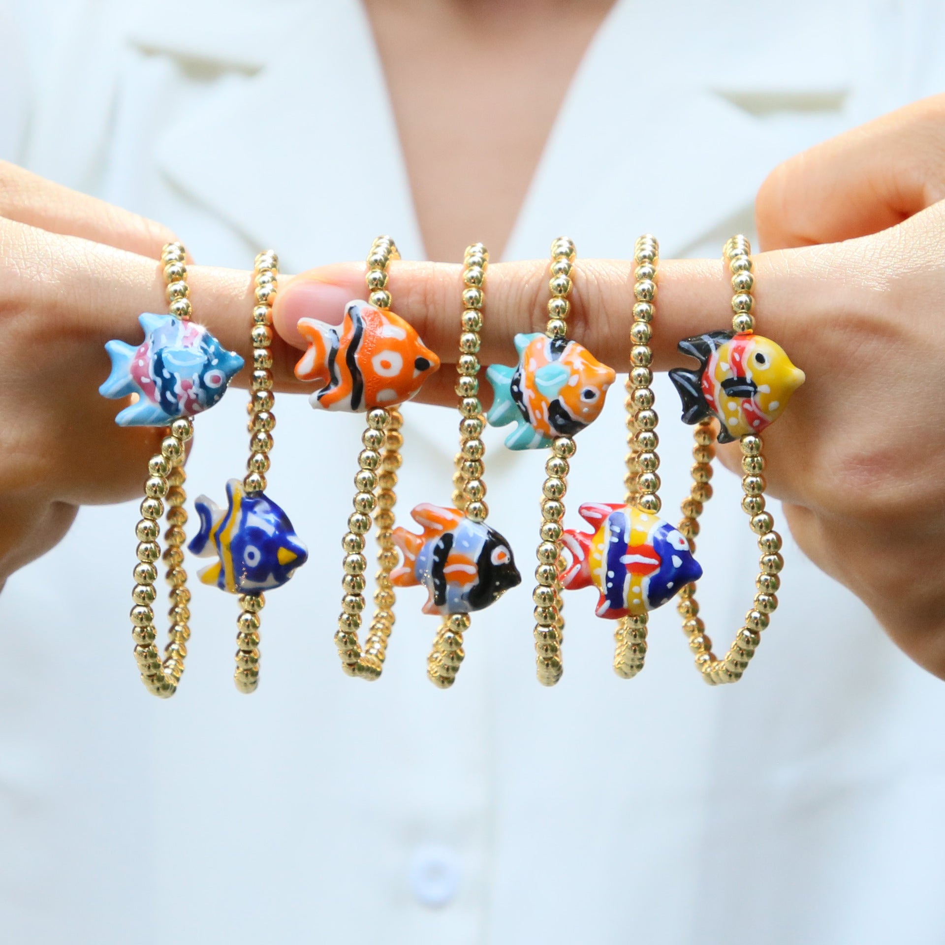 Wholesale Beach style ceramic glass colorful fish elastic rope copper bead bracelet