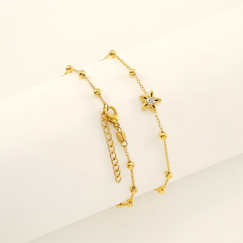 Wholesale Stainless steel bracelet with zircon flowers and a bowknot design