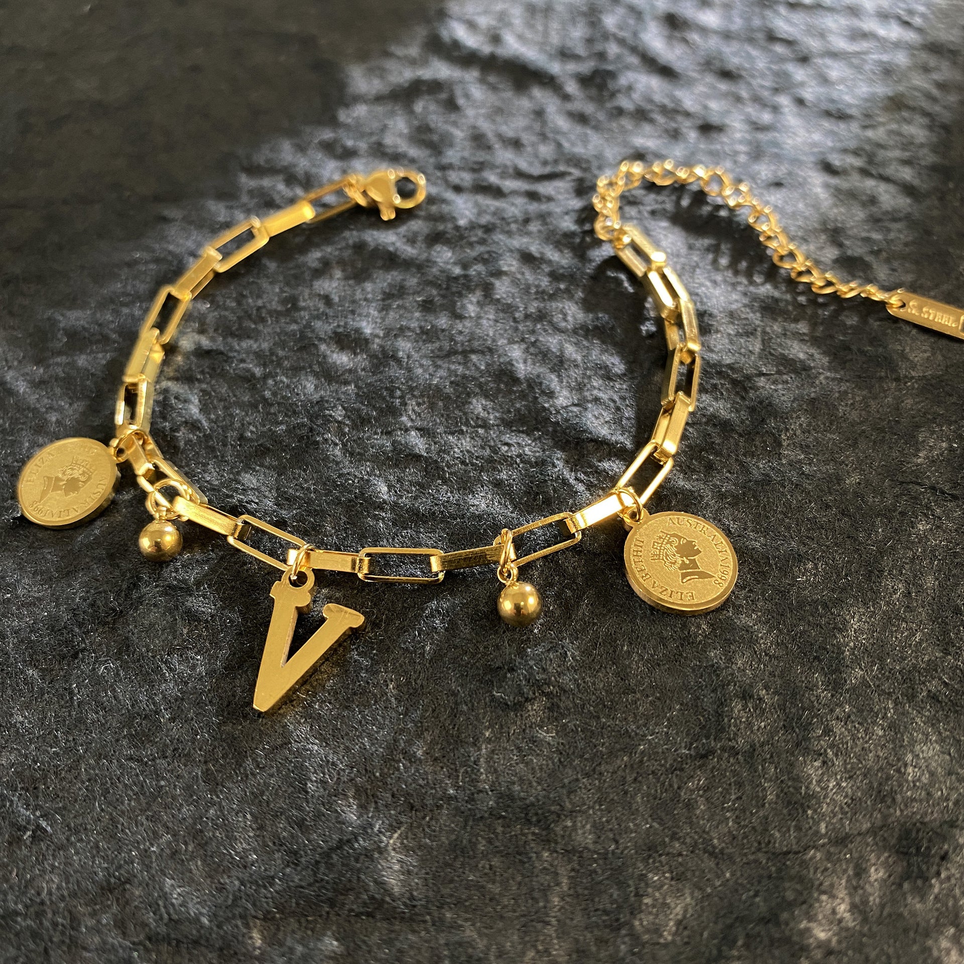 Wholesale Titanium Steel 18K Gold Plated Queen's Head Letter Bracelet ACC-BT-YuXun007