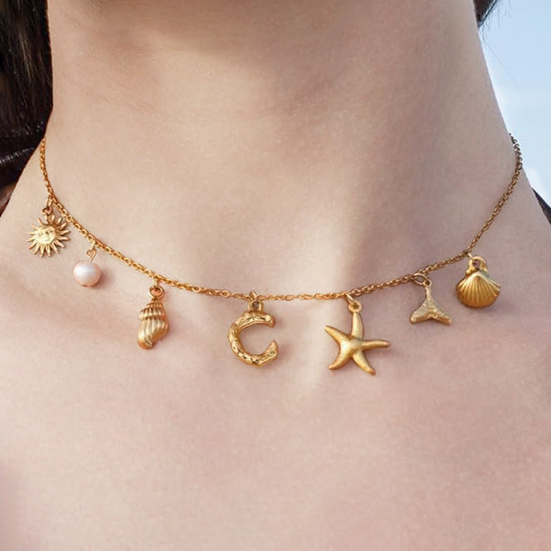 Wholesale Bohemian Shell Starfish Gold Electroplated Copper Alphabet Pendant Necklace for Women Fashion Accessory