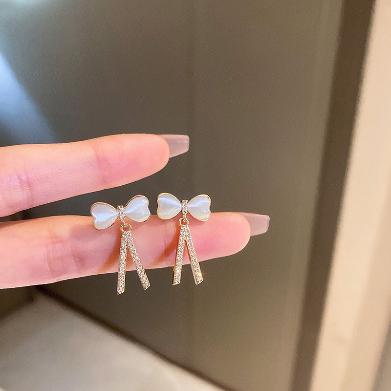 Wholesale electroplated silver needle zircon pearl flower heart earrings