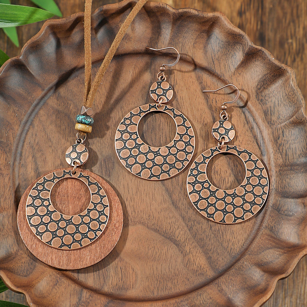 Wholesale Retro Bohemian Alloy Electroplated Jewelry Set Round Hollow Earrings Long Necklace Party Wear