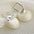 Wholesale Hollow Ball Oil Drop Ear Buckle Earrings