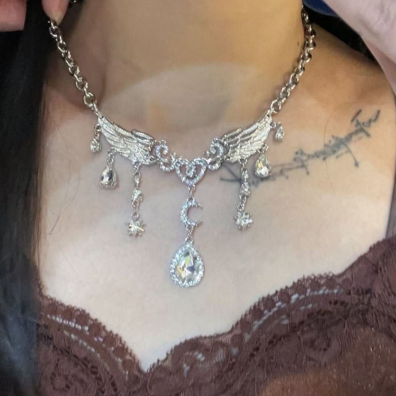 Wholesale Trendy Butterfly Star Moon Water Drop Tassel Necklace,  Silver Tone Chain,  Fashion Accessory for Boutique Resale