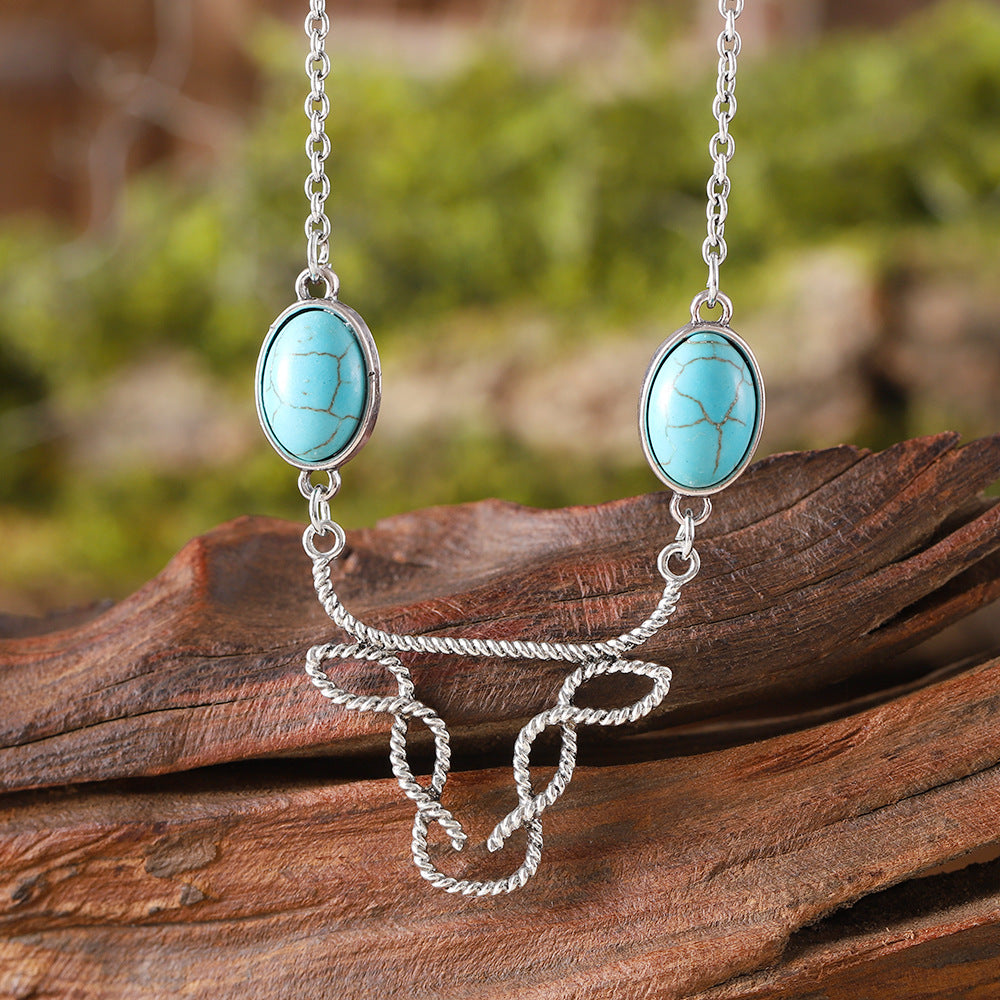 Wholesale inlaid turquoise cow head necklace Bohemian hollow  jewelry