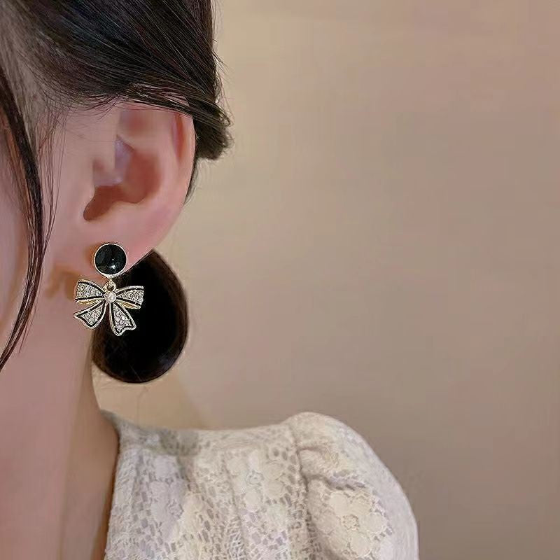 Wholesale Silver Needle Black Bow Rhinestone Earrings