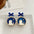 Wholesale blue bow cat earrings