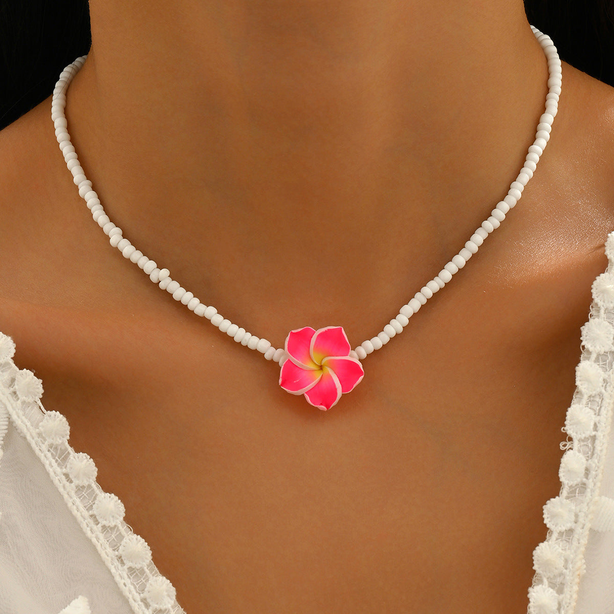 Wholesale Bohemian holiday style cute frangipani soft clay flower rice bead necklace