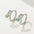 Wholesale exaggerated micro-inlaid zircon metal texture snake earrings