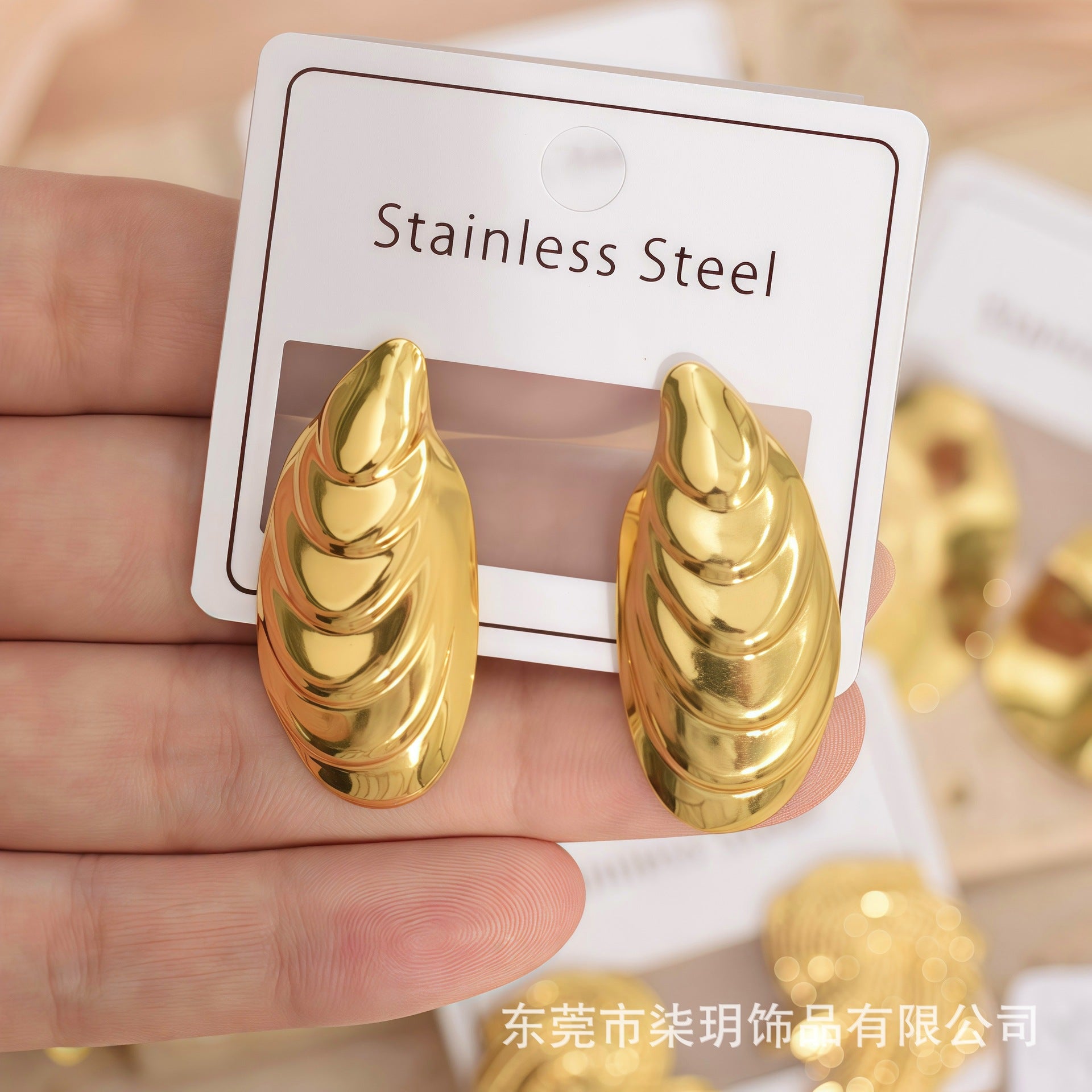 Wholesale Stainless Steel Unique Bow Irregular Stud Earrings