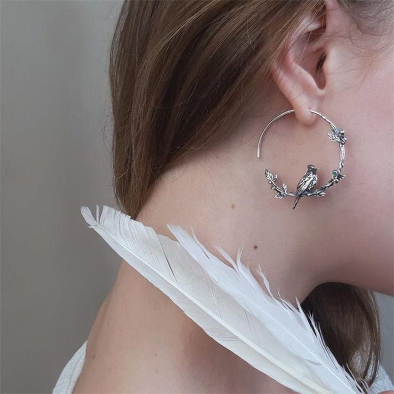 Wholesale Creative cute bird earrings 
flower earrings