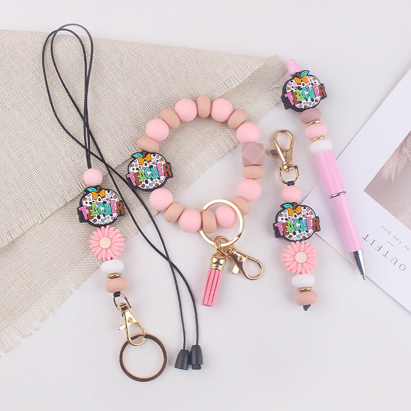 Wholesale Cartoon Teacher's Day Apple Silicone Accessories Pendant Creative DIY Four-Piece Combination Wrist Keychain