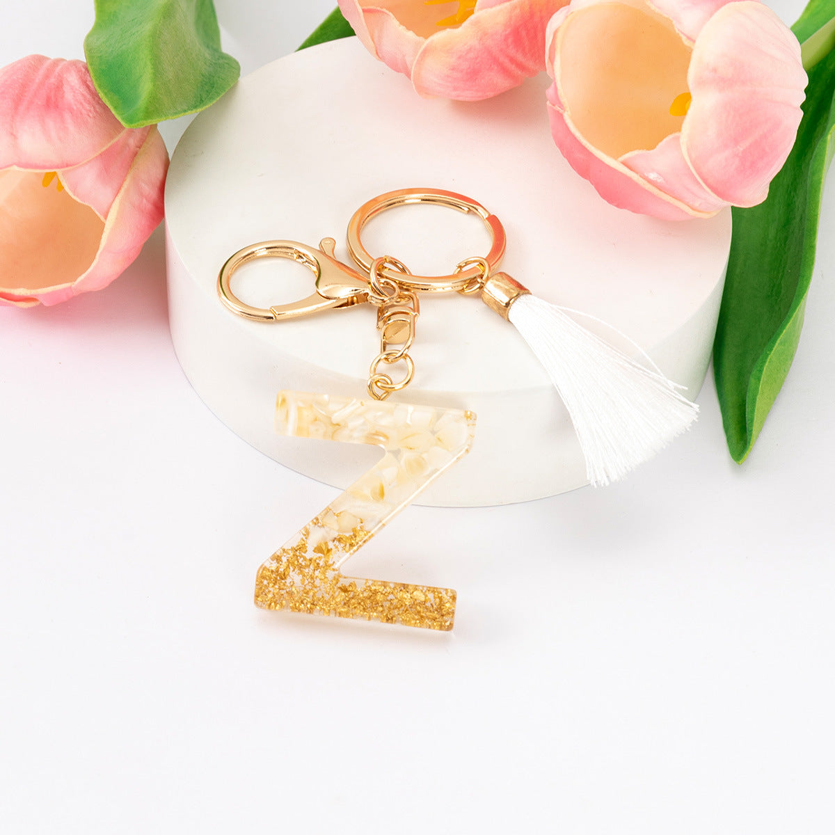 Wholesale Gold Foil New Resin Crystal Glue White Tassel Color English Digital Keychain