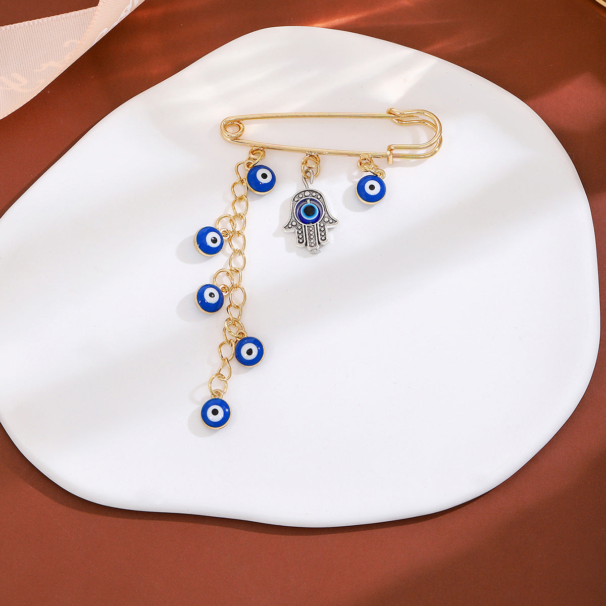 Wholesale Diamond-encrusted Devil' s Eye Tassel Brooch