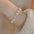 Wholesale Exquisite  Pearl Cat Claw Bracelet