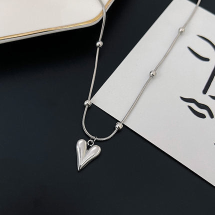 Wholesale snake bone chain heart necklace