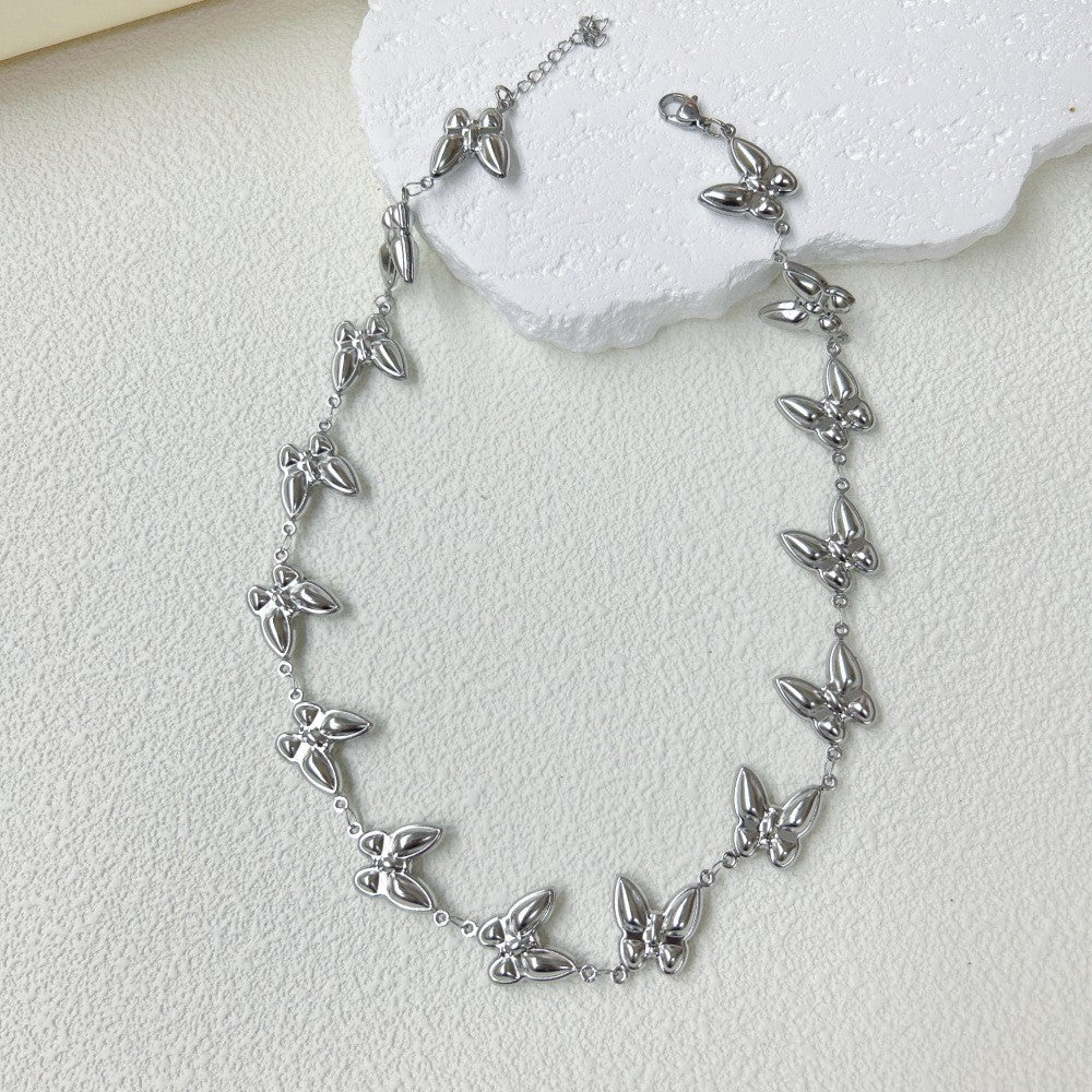 Wholesale  stainless steel three-dimensional hollow butterfly bracelet necklace suit