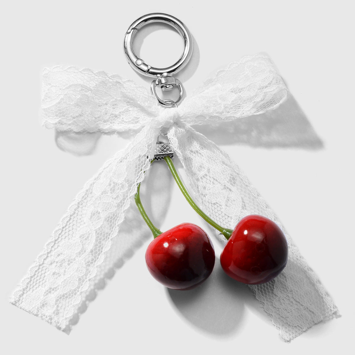 Wholesale Zinc alloy artificial pearl lace leopard print bowknot cherry keychain