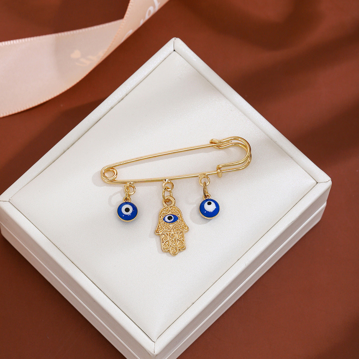 Wholesale Diamond-encrusted Devil' s Eye Tassel Brooch