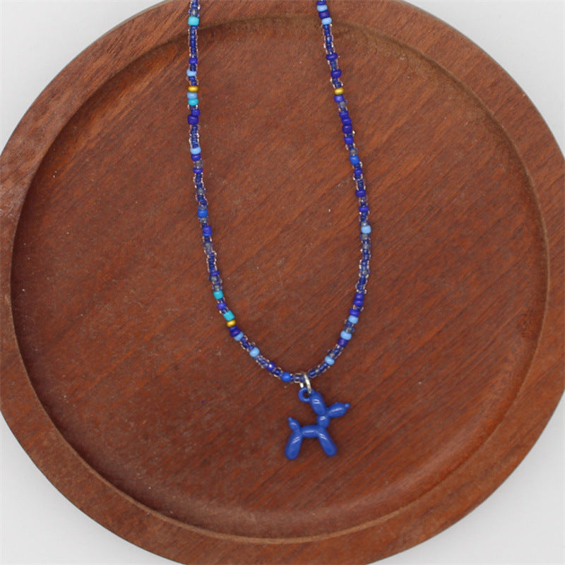 Wholesale cartoon puppy pendant macaron candy color  rice beads beaded necklace