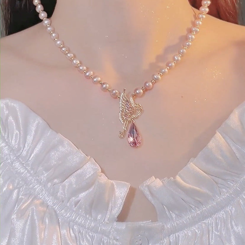 Wholesale Light luxury butterfly pearl sweater necklace