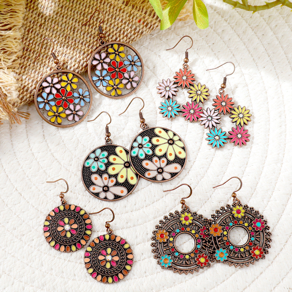 Wholesale fashion round hollow alloy earrings creative flower earrings Bohemian