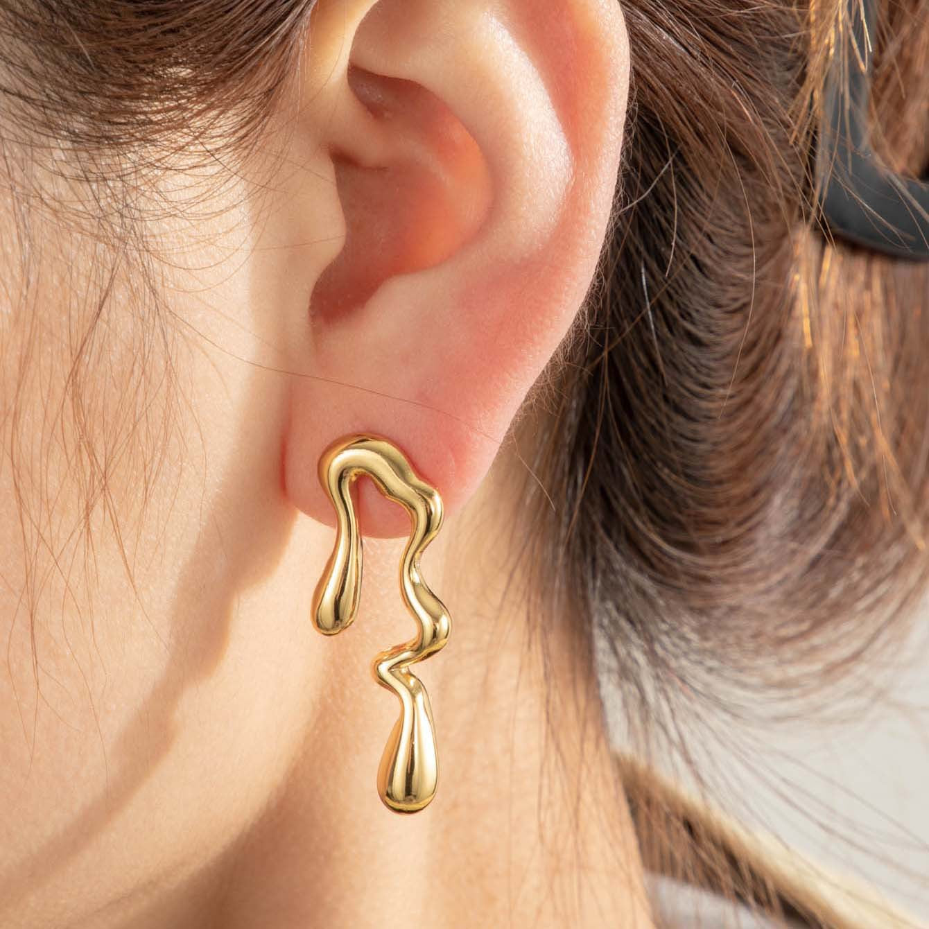 Wholesale  irregular drop-shaped love titanium steel liquid high-grade temperament  light luxury earrings