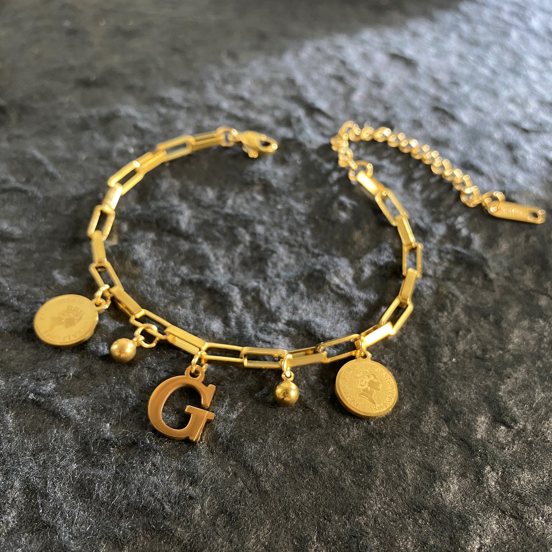 Wholesale Titanium Steel 18K Gold Plated Queen's Head Letter Bracelet ACC-BT-YuXun007