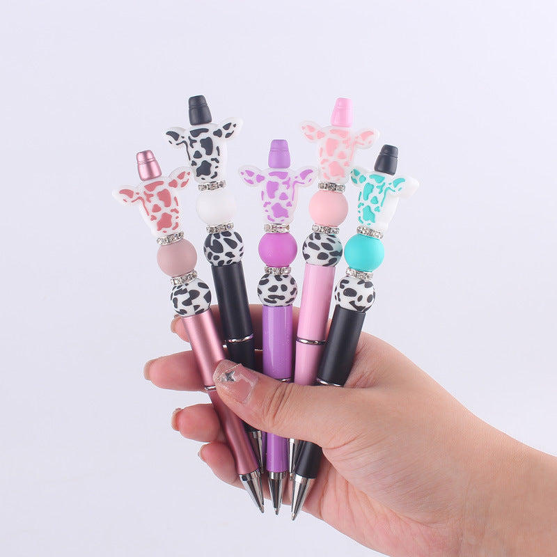 Wholesale creative cartoon cow head pattern silicone beaded pen  ballpoint gel pen