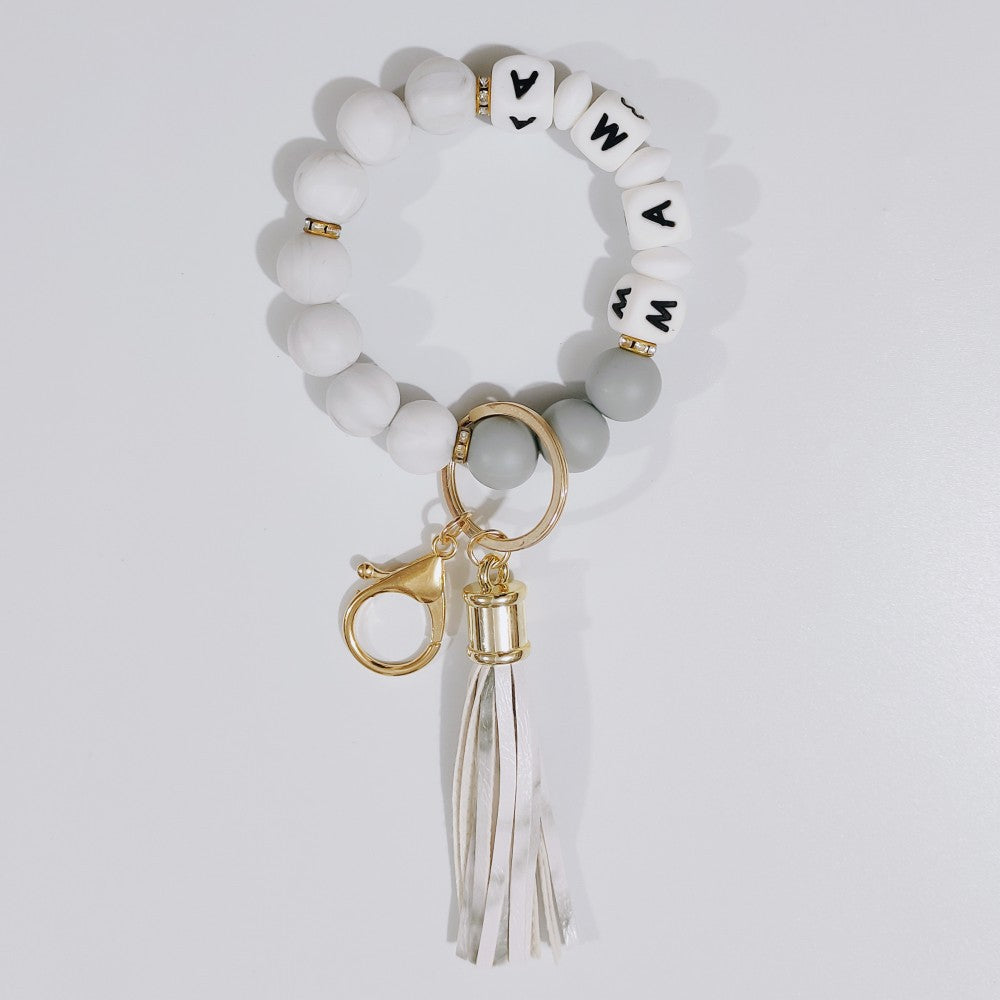 Wholesale Leopard Color Leather Tassel Keychain