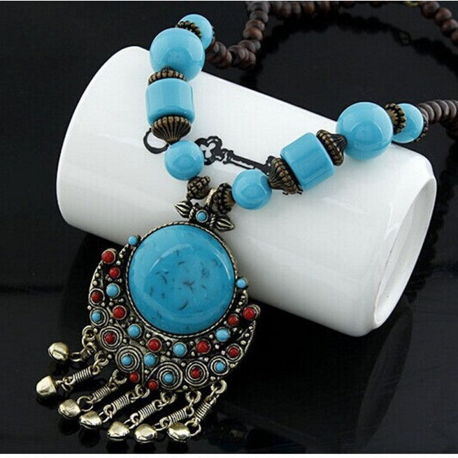 Wholesale Bohemian Turquoise Bell Pendant Long Necklace Alloy Fashion Boutique Resale