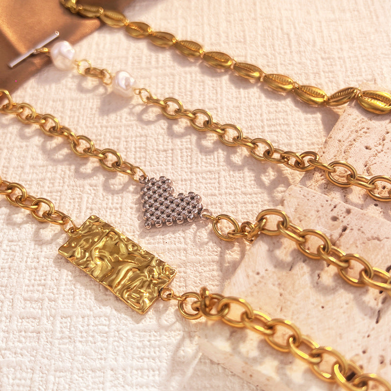 Wholesale Stainless steel bracelet with 18K gold plating,  geometric square and heart shape.