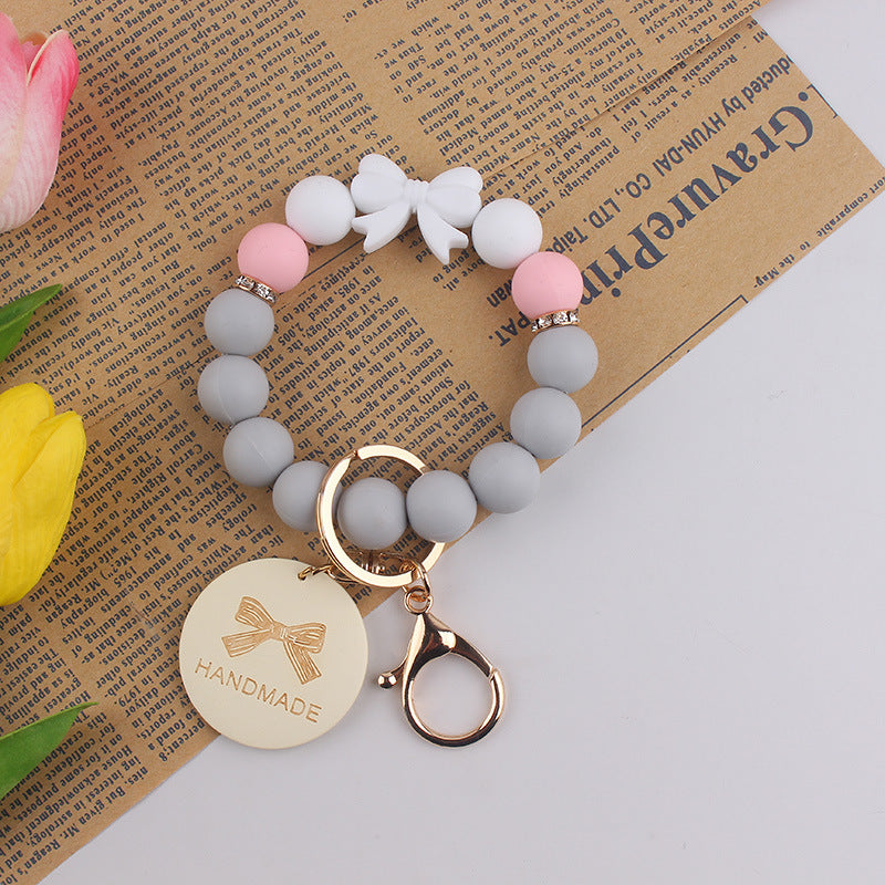 Wholesale Mother' s Day Handmade Gift: Bow-Shaped Silicone Keychain Wristlet