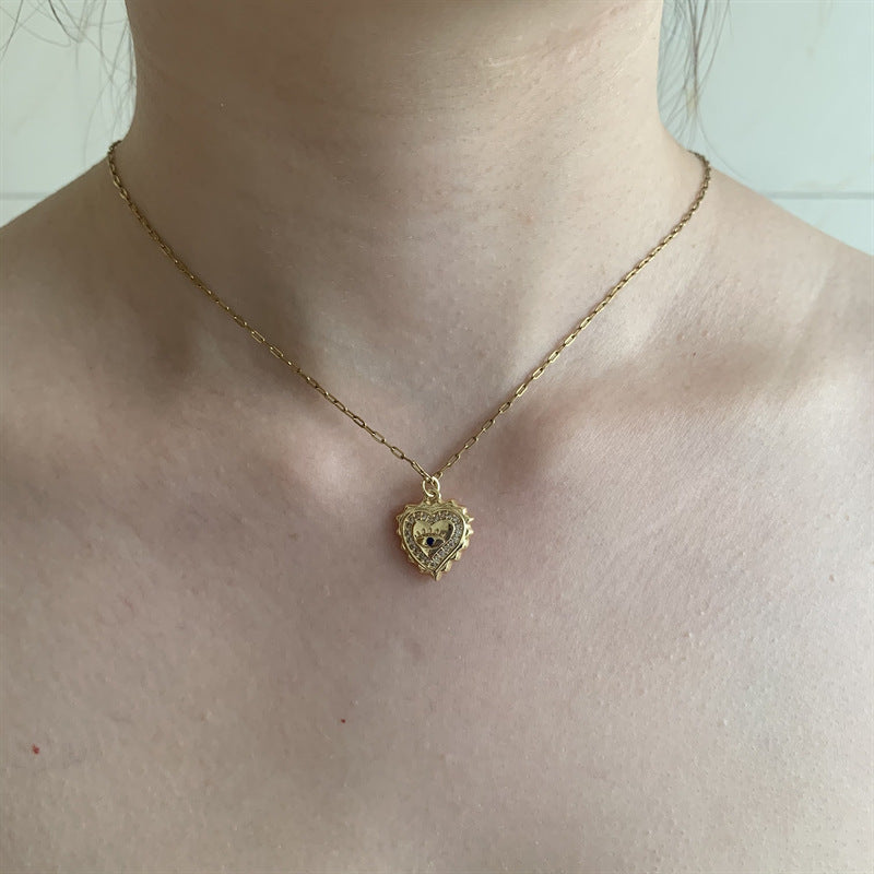 Wholesale Stainless steel heart-shaped Devil's Eye pendant necklace