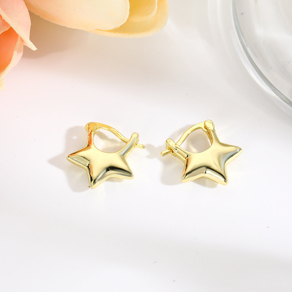 Wholesale glossy hollow star earrings