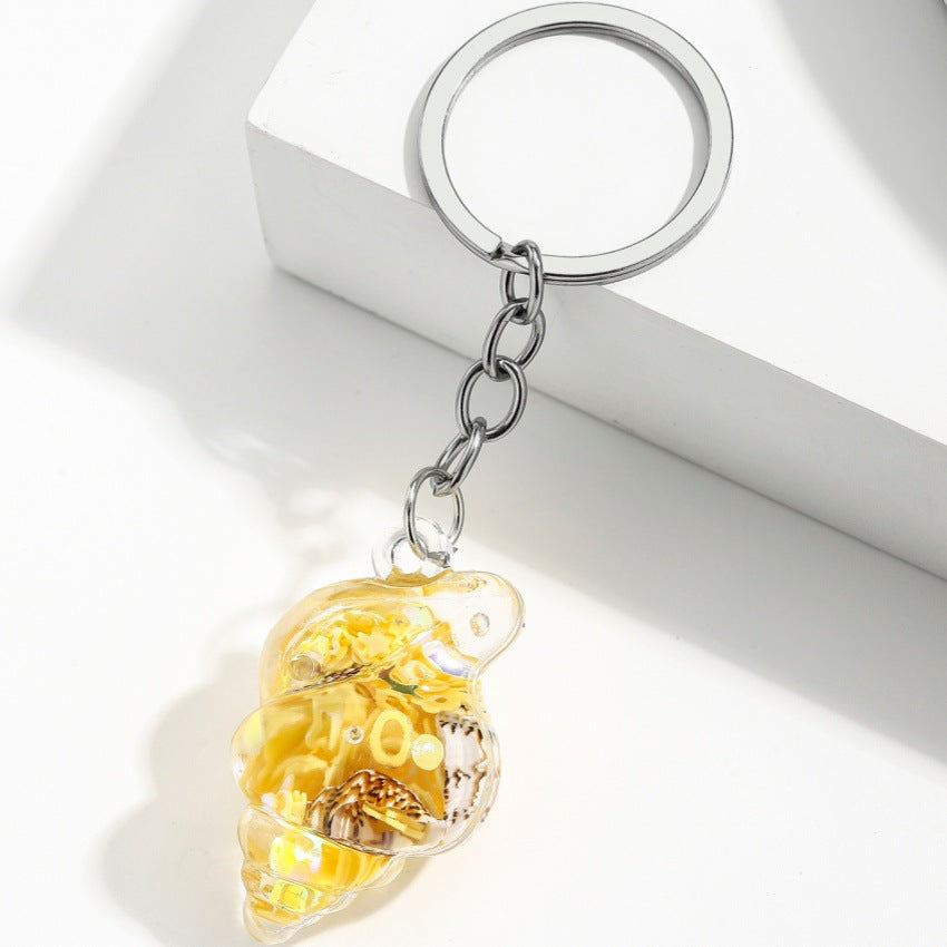 Wholesale Trendy Blue Acrylic Sea Shell Flowing Sand Keychain Charm Fashion Bag Decoration Creative Gift For Any Ocn