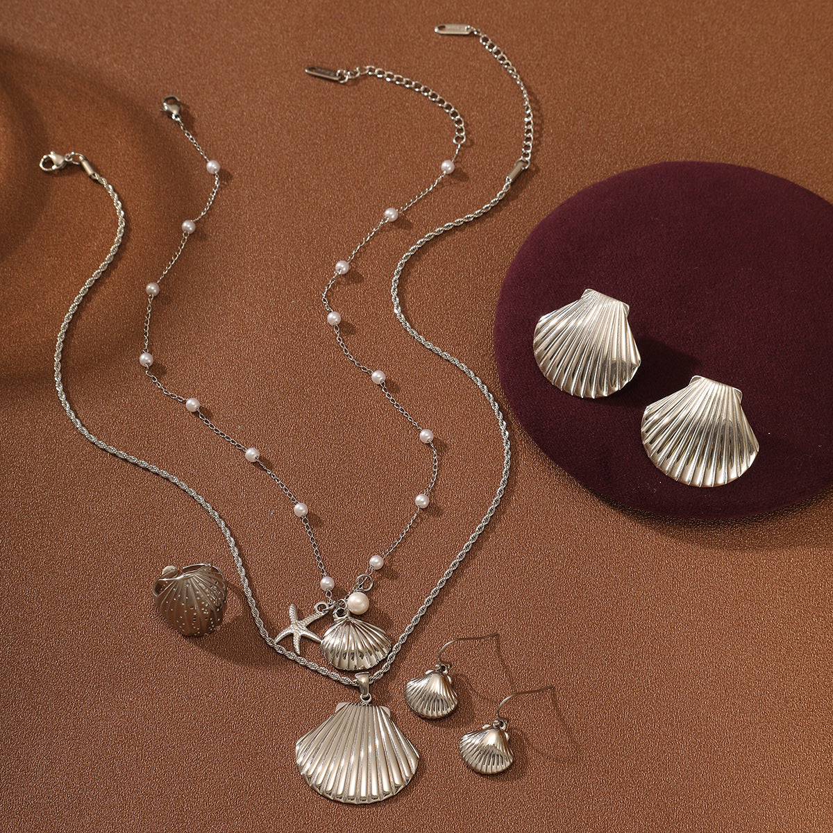 Wholesale marine shell Pearl stainless steel necklace suit