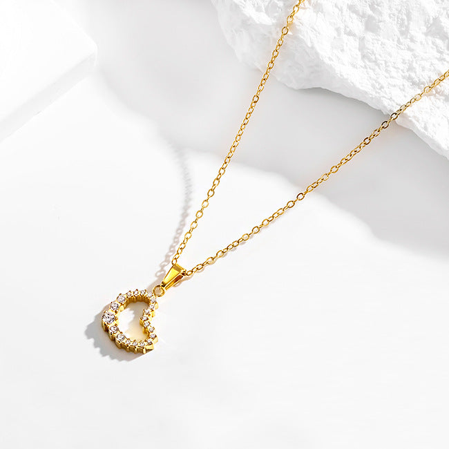 Wholesale Titanium steel heart-shaped necklace earrings and bracelet set inlaid with zircon.