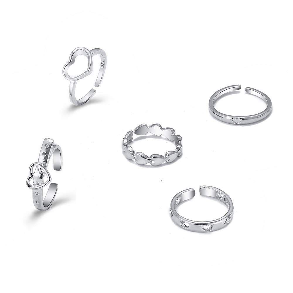 Wholesale Heart-shaped 5-piece openwork ring set