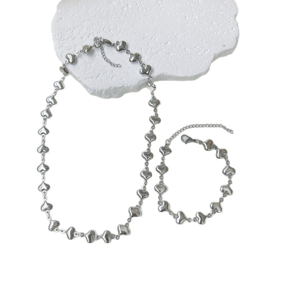 Wholesale Stainless Steel Three-dimensional Hollow Love Bracelet Necklace suit