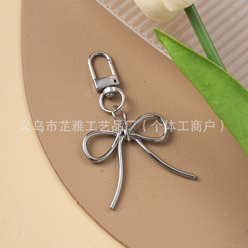 Wholesale Luxurious Resin Alloy Pearl Bow Keychains