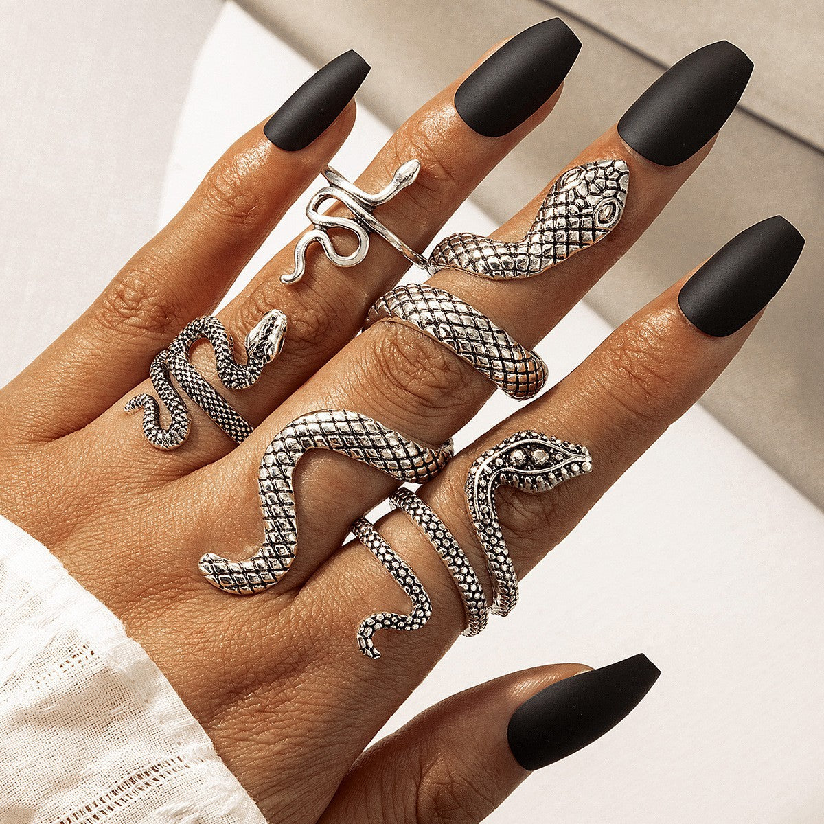 Wholesale  fashion snake ring personality punk skull hand bone ring